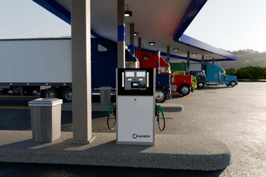 Image of fuel pump with semi trucks behind it to illustrate the ability to work in the Fleet industry