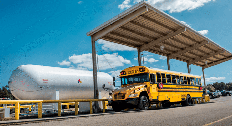 Image of school bus in front of on site fueling system
