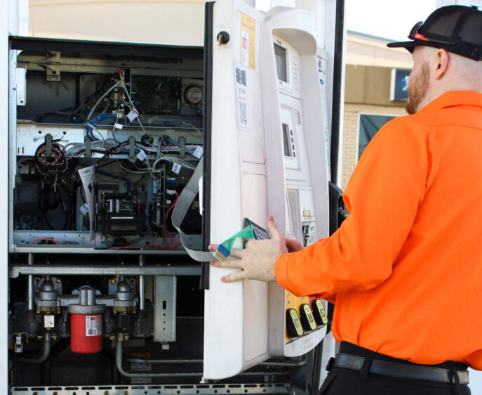 EPS Employee interacts with fuel pump system